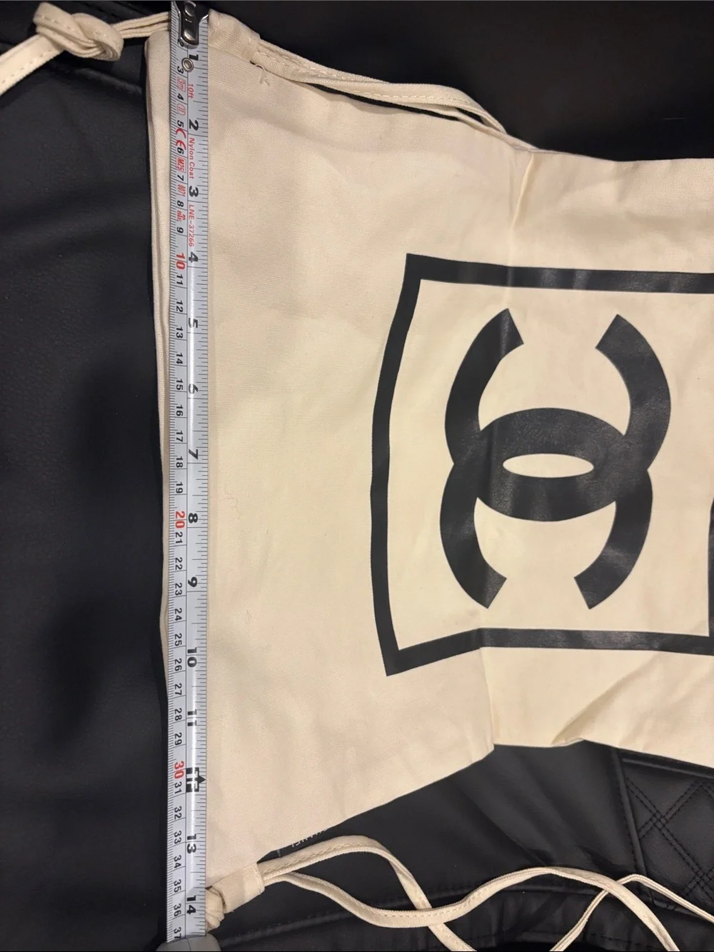 NWT Fashion Canvas Cream Drawstring Backpack with Black Logo